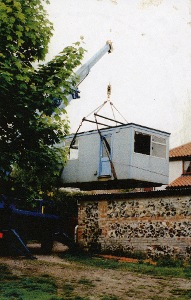The Venture Hut being craned onto the site.